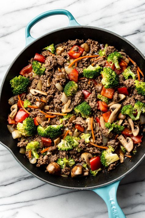 Love stir fry? Give this ground beef one a try. The homemade sauce is sweet and savory with a touch of ginger and garlic. It's loaded with vegetables such as broccoli, mushrooms, carrots, bell peppers, and scallions. Your whole family will love this simple dinner! Ground Beef Recipes Stir Fry, Ground Beef And Broccoli Stir Fry, Ground Beef And Vegetable Recipes, Ground Beef Mushroom Recipe, Ground Beef Stir Fry, Easy Beef Stir Fry, Quick Supper, Homemade Stir Fry Sauce, Ground Beef And Broccoli