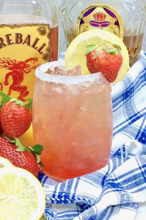 Strawberry Lemonade cocktail made with Fireball and Crown Royal whisky Fireball Drinks Easy, Spiked Strawberry Lemonade, Strawberry Lemonade Cocktail, Acholic Drinks, Lake Drinks, Fireball Recipes, Fireball Drinks, Spring Drinks, Drink Mixers