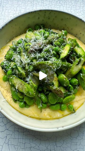 Beth on Instagram: "Polenta with asparagus, peas & pecorino - buttery, wild garlicky spring greens on a pillowy polenta bed. 

Recipe 
Makes 3-4 portions 
150g polenta
650ml boiling water 
A very good knob of butter 
1 shallot, diced 
1 bunch asparagus, sliced on a bias 
300g peas, fresh or frozen 
200g podded or double podded broad beans, fresh or frozen 
3 or 4 leaves sliced wild garlic (or use a clove of crushed garlic instead - add with the shallots if so) 
1 tbsp sliced mint 
Salt & pepper 
Grated pecorino romano 

1. Bring 650ml water to a rolling boil. Whisk in the polenta and simmer over a low heat, continuing to whisk at regular intervals until the polenta comes away easily from the sides of the pan (about 35 mins). Season generously, then whisk in the butter and pecorino to taste Mint Salt, Comforting Food, Frozen 3, Polenta Recipes, Spring Peas, Broad Beans, Pecorino Romano, Wild Garlic, 4 Leaves