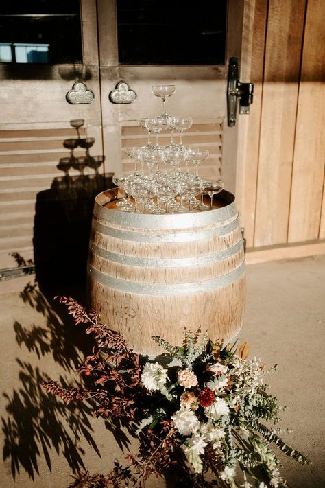 A stunning champagne tower awaits Jacqueline and Warick at their Yabbaloumba Retreat wedding reception. Set atop a rustic barrel, the glasses are ready for a cascade of champagne, with a beautiful floral arrangement adding a touch of rustic elegance to the scene. This picturesque setup captures the essence of a romantic, rustic country wedding. Plan your unforgettable wedding reception at Yabbaloumba Retreat and create memories that will last a lifetime. Country Glam Wedding, Wine Barrel Wedding, Rustic Glam Wedding, Dream Wedding Reception, Elegant Wedding Reception, Champagne Tower, Exquisite Decor, Country Weddings, Wedding Plan