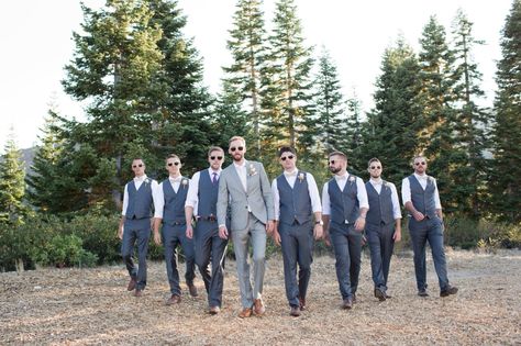 Groomsmen in dark grey with white-cinnamon linen bow ties from the Black Tux suit rentals. My handsome groom wore a light grey suit with champagne tie. All wore brown shoes and belts. Rustic, mountain top wedding in Lake Tahoe. Grey And Brown Groomsmen Attire, Dark Grey Groomsmen Suits With Champagne, Grey Suit With Bow Tie Wedding, Navy Blue Groom Gray Groomsmen, Groomsmen Attire Grey Charcoal, Light Grey Groom Dark Grey Groomsmen, Dark Grey Groomsmen, Grey Suit Brown Shoes, Hydrangea Centerpiece Wedding