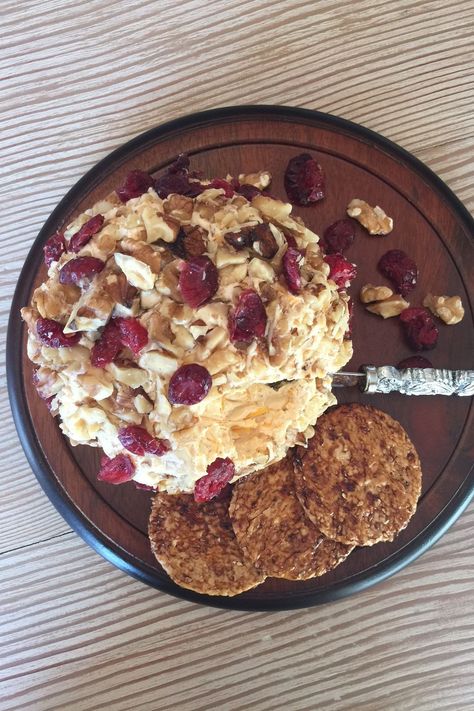 This Orange Cranberry Cheese Ball is the perfect quick and easy recipe. Whether for a holiday meal appetizer, or a snack throughout the week–combine the ingredients, let chill for an hour, and enjoy! #CheesyAppetizer #CheeseBallRecipe #AppetizerIdeas Cranberry Cheese Ball, Korean Beef Tacos, Orange Pomegranate, Cheesy Appetizer, Finger Food Ideas, Cranberry Cream Cheese, Gluten Free Soy Sauce, Orange Cranberry, Cranberry Cheese