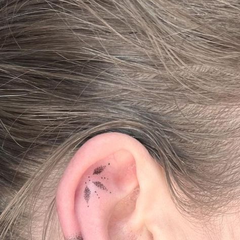 Wild Mice Tattoo on Instagram: "Ear tattoo ✨ Helt fint, helt simpelt 🤩 Tak Nadja! 🙏 #eartattoo #fineline #finelinetattoo #mandalatattoo #ornamentaltattoo #dotwork #dotworktattoo #copenhagentattoo #feminintattoo #fyp #getmoreeartattoos @unigloves @cheyenne_tattooequipment @tattooudstyr" Behind Ear Fine Line Tattoo, Delicate Ear Tattoo, Small Mandala Ear Tattoo, Floral Ear Tattoo, Ear Tattoo Dots, Hand Poke Ear Tattoo, Small Dotwork Tattoo, Ears Tattoo, Ear Dotwork Tattoo