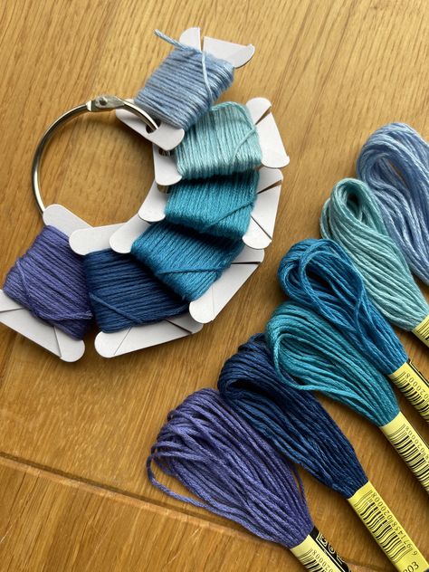 Blue embroidery floss wrapped on bobbins for easy use. No tangles. Embroidery Stitches Beginner, Grey Contacts, Shade Card, Blue Embroidery, Embroidery And Stitching, Embroidery Floss, Embroidery Projects, Embroidery Stitches, Dress Making