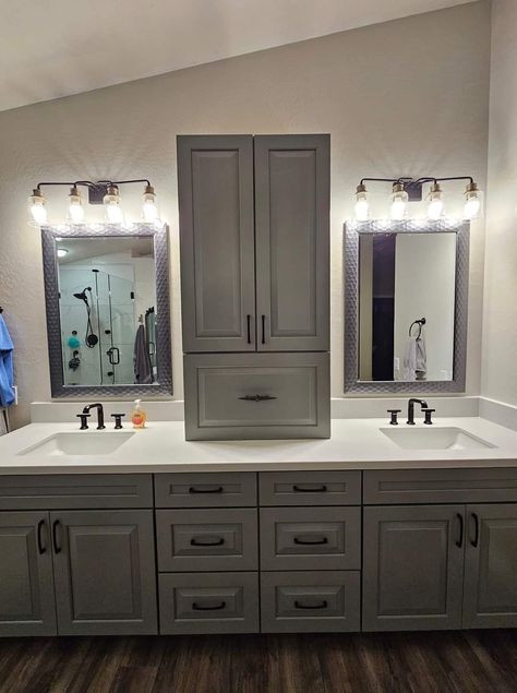 Double Vanity With Center Tower Cabinet, Double Sink Vanity With Linen Cabinet, His And Her Vanities Master Bath, Double Vanity With Linen Cabinet In Middle, Double Sink Bathroom Vanity With Linen Closet, Double Sink With Tower In Middle, Two Sink Bathroom Ideas, Double Vanity With Center Tower, Double Vanity With Tower Bar Between Mirrors