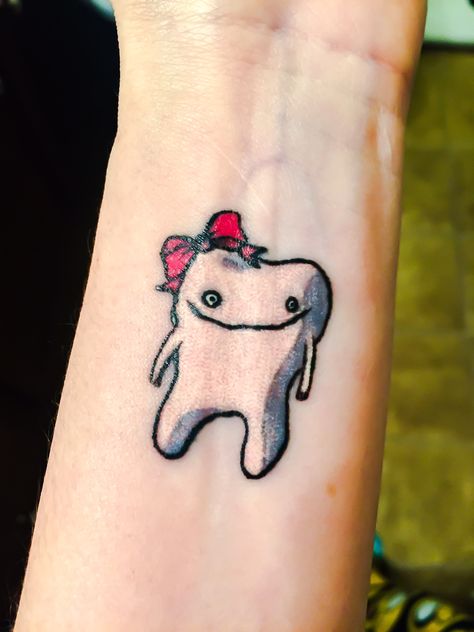 My amazing Derpetta tooth tattoo. I went with the Awkward Yeti's Derp tattoo. She reminds me everyday that I have a passion for dentistry, and that I can be pretty damn derpy, too. Sweet Tooth Tattoo, Tooth Tattoo Ideas, Tooth Tattoo, Underboob Tattoo, Face Tattoos, Face Tattoo, Dental Hygiene, Tiny Tattoos, The Meaning