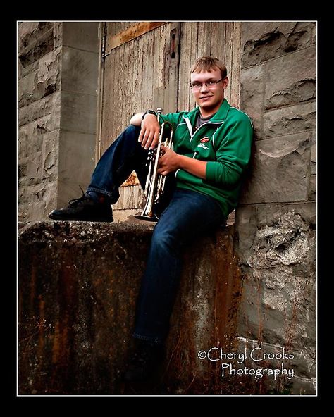 This senior plays a mean trumpet in the jazz band so it was a given that we'd include it for some of his senior portraits. This old stone building is a favorite location of mine for senior portrait sessions. Trumpet Poses Senior Pics, Senior Picture Ideas For Guys Saxophone, Senior Picture Ideas Band Clarinets, Senior Picture Ideas For Guys Trumpet, Guitar Senior Pictures Boys, Band Senior Pictures, Couple Senior Pictures, Senior Boy Poses, Country Senior Pictures