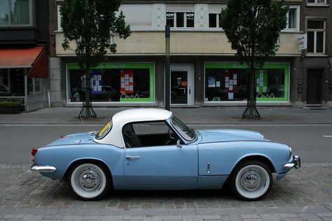 A MkII Spitfire; my first car. Mine was this colour, with the removable hard top  soft top and was a whole lot of fun. I purchased the hard top second hand and transported it home on the rear seat (!) of my other car, an Austin 1800 MkII  (The Land Crab). Soft Top Cars, Land Crab, Triumph Gt6, Triumph Motor, Triumph Cars, Triumph Spitfire, Vintage Sports Cars, British Sports Cars, Classic Motors