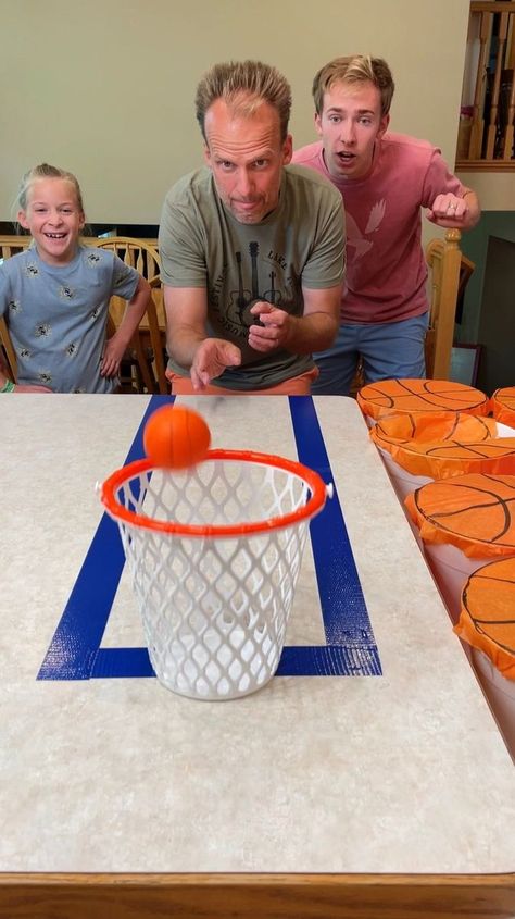 the Perfect Game for Sports Fans 🏀 | prize, basketball, sport, entertainment | the Perfect Game for Sports Fans 🏀 Kids, Dad, and family play indoor diy basketball game for fun prizes. Funny game for sports parties and basketball... | By Benson Bros | Facebook Basketball Party Games Activities, Basketball Birthday Party Games, Basketball Crafts For Kids, Sports Themed Party Games, Basketball Party Games, Library Olympics, Kids Gym Games, Benson Bros, Sports Day Games