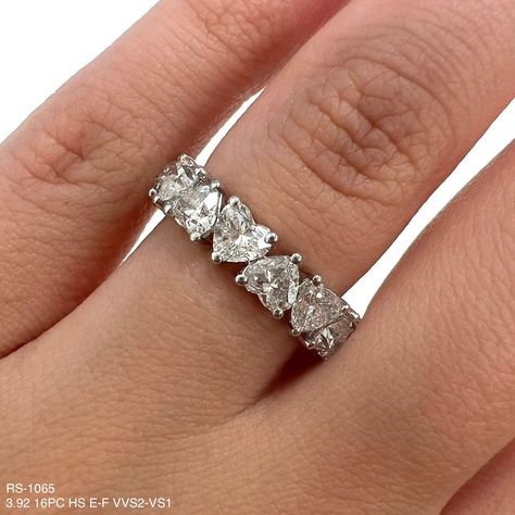 Indulge in eternal love with our exquisite 3.92 Cts Heart Shape Natural Diamond Eternity Band. Featuring high-quality diamonds in a heart shape, this band brings a touch of luxury to any look. Perfect for special occasions or everyday wear, this band will be a timeless addition to your jewelry collection. DIAMOND 3.92 HS TCW 16 PCS E-F VVS2-VS118K WG 3.15 GRAMS SIZE 5.00 RS-1065 Heart Eternity Ring, Diamond Eternity Band, Heart Shaped Diamond, Heart Wedding, Eternity Band Diamond, Diamond Eternity, Girly Jewelry, Eternal Love, Eternity Band