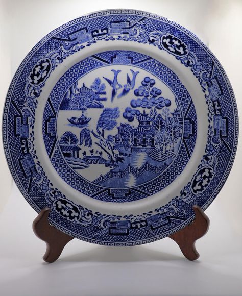 The blue willow pattern was created in England in 1779 and has been replicated by pottery makers around the world including China, Japan and Canada amongst others. The Blue Willow Pattern has a specific pattern including the doves, the stream etc. In order to be called Blue Willow it must contain all the elements. These plates appear to be very old and are stamped using a transfer ware stamp on the back. The stamp reads S Ltd H and features a house or church that is reminiscent of the Washington Antique Blue Willow, Blue Willow Pattern, Pottery Makers, Pottery Marks, Willow Pattern, Blue Willow, Stoke On Trent, Collectable Plates, A House