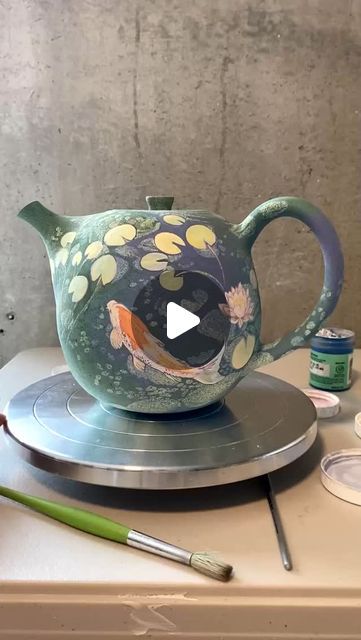 Tanaya Shirsikar on Instagram: "Underglaze hand-painting on porcelain before glaze firing.
I attempted to draw the leaves in a way that forms a doorway.  It's so interesting how composition works in 3-dimensional objects, spanning across all surfaces and changing the way your eyes move through the drawing. 
*This piece is part of a special commission order.

#porcelain #handmadeceramics #porcelainpottery #pottery #amacovelvetunderglaze #potteryprocess" Painting Reference, Hand Painting, Handmade Ceramics, Your Eyes, To Draw, Glaze, The Way, Composition, Porcelain