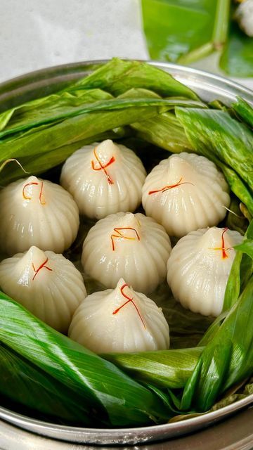 Omkar Pawar on Instagram: "Ukadiche Modak🥥🥟🤤.
Get ready to indulge in the deliciousness of ukadiche Modak, the beloved sweet dumpling of Maharashtra! These steamed delights are filled with the perfect combination of jaggery and coconut. Offering these Modak during Ganesh Chaturthi is not just a tradition, it's a gesture of devotion and love, believed to bring good luck and blessings.🍀✨

Recipe ingredients and tips

Modak dough:
Basmati rice flour 2 cups
Water 2cups
Desi ghee 1tbsp
Salt to taste 

Mix the dough in boiling water, then switch off the flame, cover it, and keep it covered for 10 minutes. After that, knead the dough until it becomes soft.

Saran :
Grated coconut 200gms
Jaggery 250gms
Cardamom powder 1tsp
Nutmeg 1pinch
Desi ghee 20gms

Remember to knead the dough then fill th Modak Sweet, Ukdiche Modak, Ukadiche Modak, Sweet Photography, Sweet Dumplings, Cardamom Powder, Grated Coconut, Recipe Ingredients, Ganesh Chaturthi