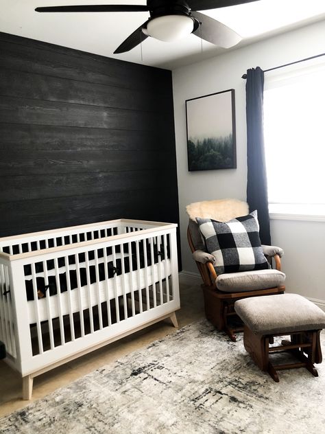 Black wood wall rustic modern nursery Black Shiplap Wall Nursery, Black Accent Wall Nursery, Wood Wall Nursery, Babyletto Scoot, Black Trim Interior, Shiplap Nursery, Buffalo Plaid Nursery, Black Wood Wall, Baby Boy Room Themes