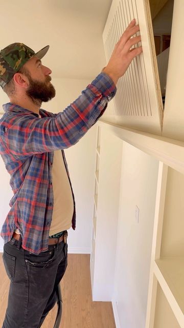 Cicada Co. on Instagram: "This beautiful sunroom addition required the use of a mini-split HVAC unit, however, we did not want the cassette to be the focal point of the room. We designed this bookcase and soffit to center up the room and disguise the unit itself. Our team fabricated this custom grill with magnetic closures to access the unit for maintenance or repair! #interiordesign #designbuild #minisplit #custombuild #customcabinetry #custommillwork #customeverything" Hide A Mini Split, Mini Split Cover Ideas, Mini Split Cover, Wall Remodel, Sunroom Addition, Custom Grill, Hvac Unit, Split System, Sun Porch