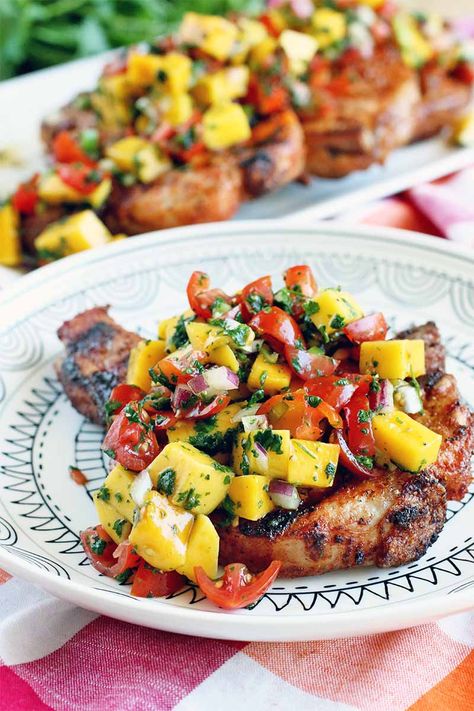 Pork Chop And Salsa Recipes, Pork Chop With Mango Salsa, Mango Salsa Pork Chops, Pork Chop Recipes With Fruit, Summer Pork Chops, Summer Pork Recipes, Pork With Mango Salsa, Grilled Dinner Ideas, Mango Dishes