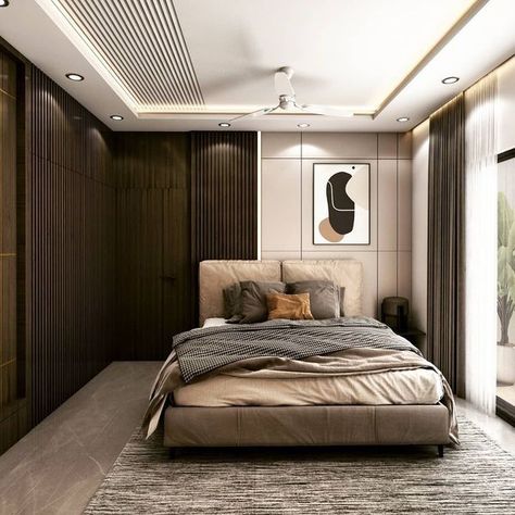 The Bedroom has a Combination of Grey, Beige & Brown Consists of a Single 🛏 Bed with Wooden Legs & Square Cushioned Backrest. The 👔 Wardrobe has Vertical Grooves & the same Groove Pattern is Continue in the Ceiling. Study 📚 Table on the Opposite Wall has Space for Working Desk, Book Shelves & Shelves for Décor Items is highlighted by Led Lights. And, POP False Ceiling with Recessed & Cove ✨ Lights complements the Space - GharPedia Pop Grooves On Wall, Pop Groove Ceiling Design Bedroom, Grooves In Ceiling, Wooden Ceiling Bedroom, Ceiling Groove Pattern, False Ceiling Groove Design, Groove Pattern On Wall, Bedroom False Ceiling Design Modern Simple, Bedroom Pop Ceiling Design