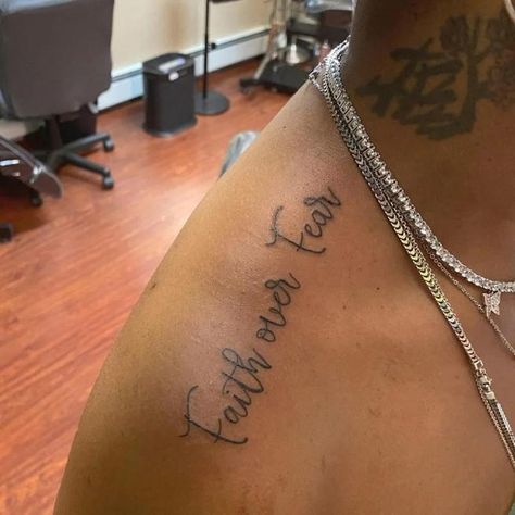 32 Best Faith Over Fear Tattoo Ideas  30 Faith Over Fear Collar Bone Tattoo, Highly Favored Tattoo, Favored Tattoo, Faith Over Fear Tattoo Ideas, Fear Tattoo Ideas, Faith Over Fear Tattoo, Blessed And Highly Favored, Fear Tattoo, Tattoo Over Scar