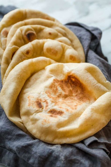 This homemade Pita Bread Recipe puffs up beautifully to form a pocket inside. Learn how to make Pita Bread with oven and stovetop methods. How To Make Pita Bread, Potato Bread Recipe Homemade, Vegan Pita Bread Recipe, Healthy Sweet Potato Bread, Pita Bread Recipes, Homemade Pitas, Bread Recipes Quick, Greek Pita Bread Recipe, Sweet Potato Bread Recipe