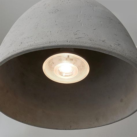 By adding this luxuriously chic textured pendant into your space, it's a guarantee for your guests to stop and stare! Minimalism never looked so good with a streamlined concrete dome shade, a black fabric cord and a chrome canopy to finish the look. This striking pendant comes equipped with its own energy-efficient LED bulb that will provide the perfect amount of lighting to your kitchen or dining room. Due to the nature of concrete, no two will be exactly alike in color, shape, or texture, adding to the unique charm of this wonderful piece. Concrete Light, Fabric Cord, Unique Charms, Energy Efficient, Black Fabric, Led Bulb, Dining Room, Ceiling Lights, Shades