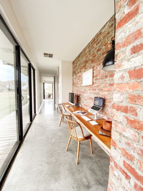 Our recycled red brick wall is strategically placed to improve thermal mass. In winter, the sun comes in under the north eave warming the bricks and concrete floor providing us with free natural heating. Scandi Barn House, Red Brick Interior, Brick Feature Wall, Rural Property, Sydney House, Brick Interior Wall, Sustainable House, Cute Farmhouse, Red Brick Wall