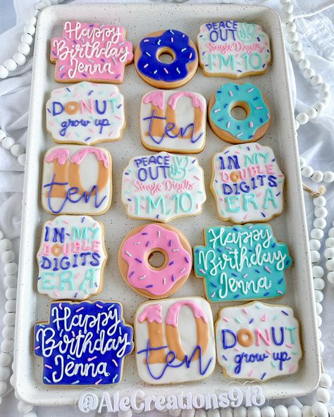 Donut grow up cookies 🍩 // In my double digit era // Donut birthday cookies 🍪 Pricing? 👉🏻 https://msha.ke/alecreations918 • • • • #alecreations918 #tulsasmallbuisness #tulsaoklahoma #decoratedsugarcookies #customcookies #cookie #cookies #decoratedcookies #inspirationcookies #cookiesofinstagram #desserts #dessertideas #dessertideas #partyideas #party #sugarcookies #royalicing #royalicingcookies #cookies #cookiesideas #royalicingideas #donutcookies #donutgrowupcookies #donutcookie #birthdaycoo... Birthday Cake Decorated Cookies, Birthday Cookie Ideas, Donut Sugar Cookies, Tennis Cookies, Birthday Decorated Cookies, Happy Birthday Donut, Donut Cookies, Up Cookies, Happy Birthday Cookie