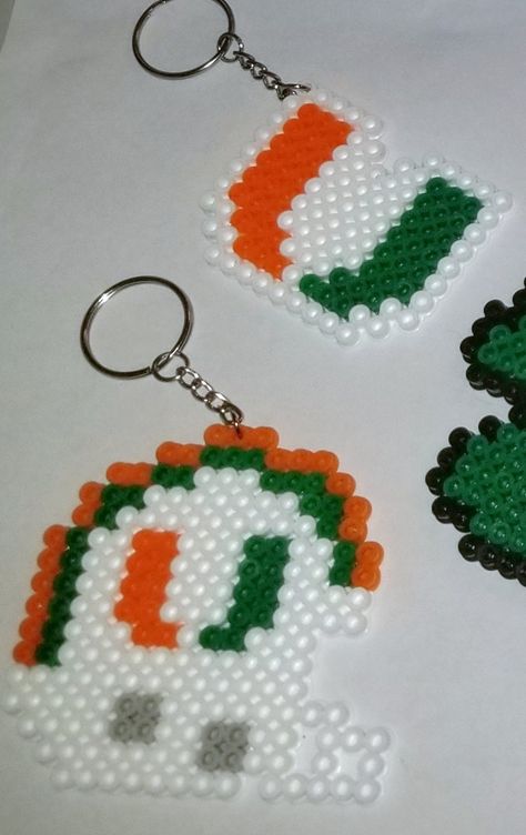 Miami Hurricane keychains! Our custom perler patterns! Football Perler Beads, Football Teams, Perler Patterns, Fuse Beads, Perler Bead, Plastic Canvas Patterns, Canvas Patterns, Plastic Canvas, Perler Beads