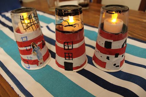 Cup lighthouse craft for kids! So cool using fake tea lights! Lighthouse Keepers Lunch, Lighthouse Project, Lighthouse Crafts, Paper Cup Crafts, Lighthouse Lighting, Inexpensive Crafts, Lighthouse Keeper, Clear Cups, Solo Cup