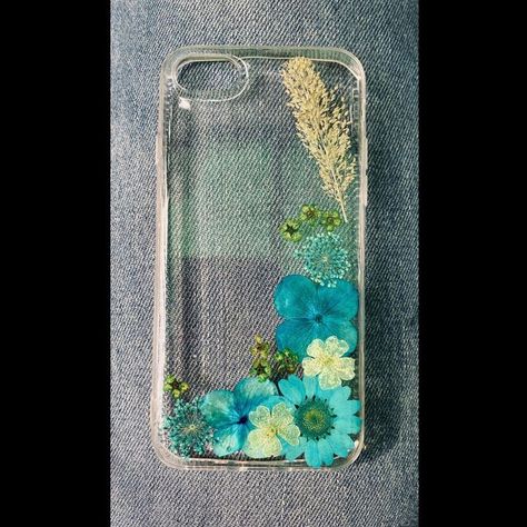 Resin | Candles | Gifts on Instagram: "Introducing our new customised resin real dried flowers phone covers 🌸 Customisation of flowers and phone covers available. DM Us To Order price will differ according to the design. #resinart #resin #resinartwork #phonecover #phonecovers #phonecases #fyp #trending #reels #explore" Resin Cover Phone, Resin Phone Cover Design, Resin Phone Cover, Diy Resin Phone Case, Wallpaper Sky, Phone Cover Design, Iphone Wallpaper Sky, Trending Reels, Apple Phone Case