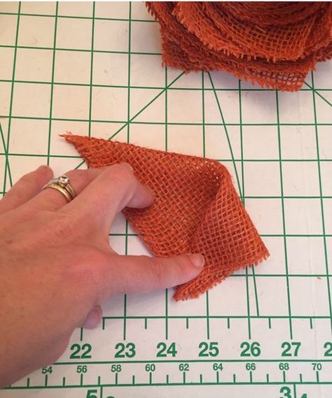 Fold orange burlap squares to make this burlap pumpkin wreath Bandana Wreath, Burlap Pumpkin Wreath, Pumpkin Wreath Diy, Easy Fall Wreaths, Shaytards, Burlap Pumpkins, Mickey Mouse Pumpkin, Straw Wreath, Burlap Flower