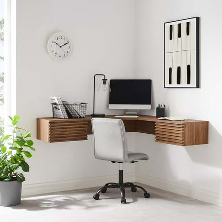 Tap into mid-century aesthetics with the Render Wall-Mount Corner Office Desk. This corner office desk features a durable particleboard frame with smooth wood grain laminate, a cable management hole, and two full-extension glide drawers for ample storage space of all your office essentials. Boasting a mid-century modern style and nestling into the corner of an office, this computer desk features a solid construction with a pleasing look and practical functionality. Perfect for the apartment, hom Floating Corner Desk, Corner Office Desk, Wood Office Desk, Corner Desk Office, Wall Mounted Desk, Corner Office, Floating Desk, Mid Century Modern Walls, Bed Desk