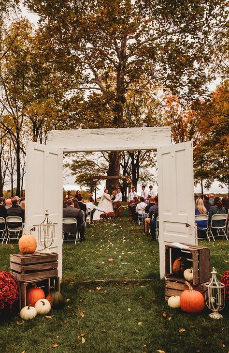 Autumn Aisle Decorations Wedding, Pumpkin Ceremony Aisle, Pumpkin Lined Wedding Aisle, Aisle Decorations Wedding Outdoor Fall, Apple Crate Decor, Fall Wedding Entrance Decor, Fall Mums Wedding Decor, Fall Wedding Arbor Decor, Pumpkin Patch Wedding Ideas