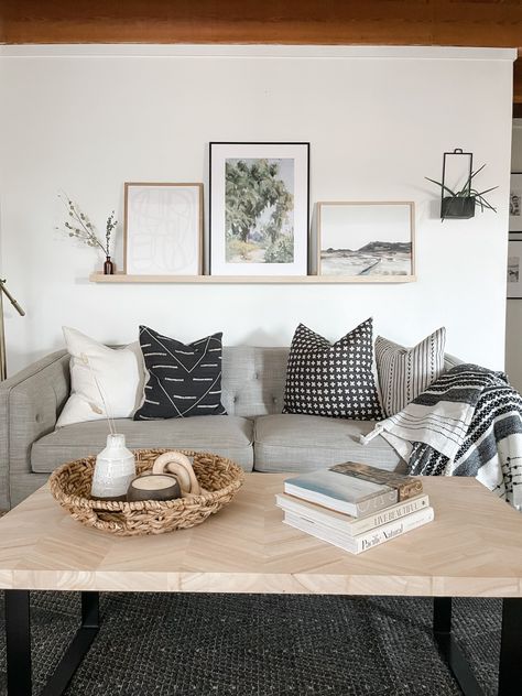 How to Effortlessly Style a Picture Ledge - allisa jacobs Photo Ledge Above Couch, Style A Picture Ledge, Above Couch Shelf, Frames Above Couch, Shelf Over Couch, Wall Behind Couch Decor, Wood Picture Ledge, Behind Couch Decor, Allisa Jacobs