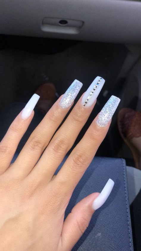 White Glam Nails Glitter, Formal White Nails, White Sparkle Nail Designs, White Nails Acrylic With Diamonds, White Nails With Diamonds Rhinestones, White Nails With Silver Designs, White Sparkle Nails Acrylic, White And Silver Acrylic Nails, White And Silver Nails Acrylic