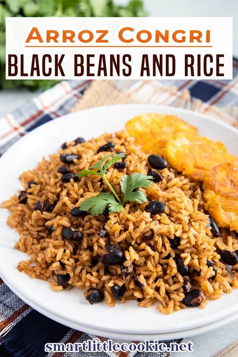 This Black Beans and Rice or Arroz Congri is a popular Latin Caribbean dish filled with Latin flavors like garlic, oregano, and cilantro. Black Beans and Rice or Arroz Congri is a traditional rice dish popular in Cuba and the Dominican Republic. Like most Latin Caribbean dishes, there are a lot of similarities and also slight differences in preparation from country to country. | Smart Little Cookie @smartlilcookie #blackbeansandrice #latinrecipes #dominicanrecipes #smartlittlecookie Easy Black Beans, Black Beans And Rice Recipe, Slow Cooker Pork Roast, Cilantro Chicken, Black Beans And Rice, Dominican Food, Beans And Rice, Roasted Brussel, Rice Dish