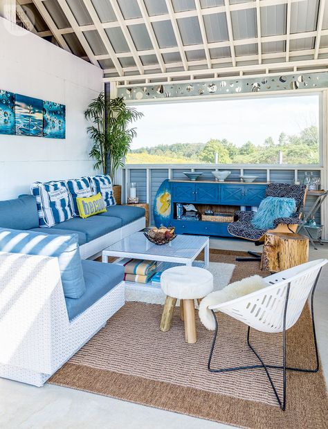 A coast-inspired blue and white interior defines this cabana {PHOTO: Robin… Coastal Industrial Decor, Blue And White Interior, House Exterior Before And After, Mediterranean Style Living Room, Outdoor Couch Diy, Vintage Coastal Decor, Rustic Coastal Decor, Coastal Industrial, Living Room Wall Decor Ideas