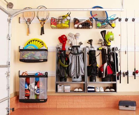 The garage can become a cluttered mess very quickly. Use the walls for storage. #organizing #garage Golf Storage, Backyard Golf, Sports Display, Sports Equipment Storage, Garage Solutions, Sports Storage, Ultimate Garage, Garage Storage Solutions, Garage Organize