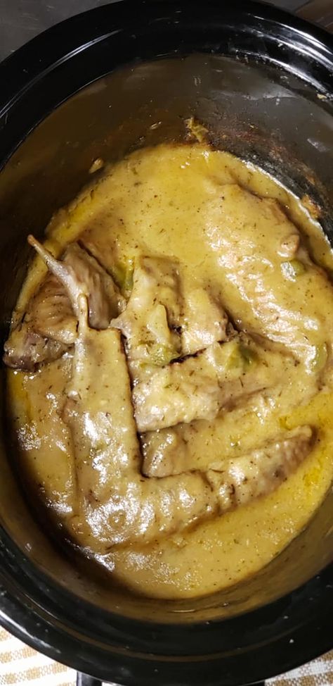 Delicious Easy To Make Slow Cooked Smothered Turkey Wings in a crock pot Smothered Turkey Wings Crockpot Easy Recipes, Turkey Wings Recipe Smothered Crockpot, Smothered Turkey Necks Crock Pot, Turkey Wings Recipe Soul Food Crock Pot, Turkey Wings Recipe Crockpot Crock Pot, Turkey Wings In Crockpot, Crockpot Smothered Turkey Wings, Southern Turkey Wings, Smoother Turkey Wings