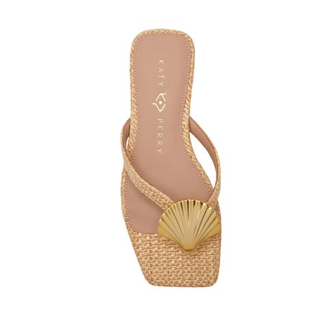 Product Code: KP2915  Dress up a classic thong sandal with the Camie Shell Sandal in Basket Woven Raffia by Katy Perry. Featuring a memory foam sock lining and a seashell ornament.    * Man-made Upper and Lining   * Padded Footbed   * 0.5 Inch Heel Height Sea Shell Sandals, Cute Beach Shoes, Seashell Heels, Seashell Shoes, Beachy Heels, Cute Sandals For Summer, Beach Heels, Shell Sandals, Straw Shoes