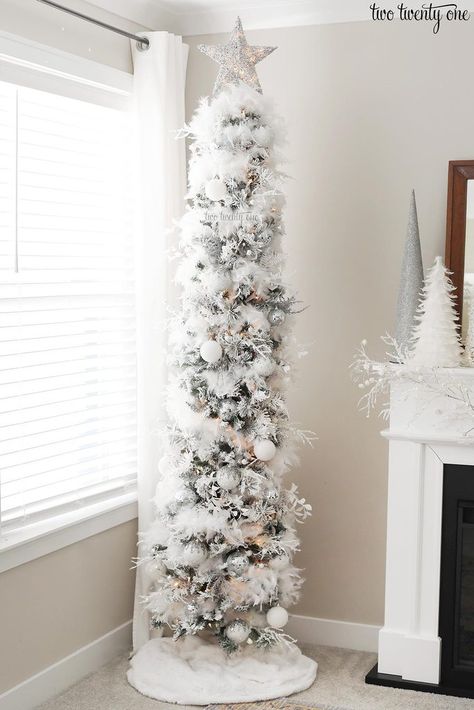 White Slim Tree, Rustic White Christmas Tree Ideas, White Pencil Christmas Tree Ideas, Flocked Pencil Tree Decorating Ideas, Slim Xmas Tree Decorating Ideas, Slim White Christmas Tree, Pencil Tree Decorating Ideas, White Pencil Christmas Tree, White And Silver Christmas Tree