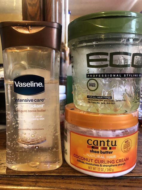 Mixing these together has done wonders for my hair, first apply a little of the Vaseline intensive (for skin but I use on hair), next you add Eco to your edges to lay them down and finally, you grab the Cantu curling cream, rub into hands and apply on the left out hair💕You will not regret it💛 How To Use Cantu Products, Cantu Curling Cream, Cantu Curls, Shea Butter Hair, Pure Cocoa Butter, Coconut Hair, Liquid Oil, Butter Oil, Body Gel