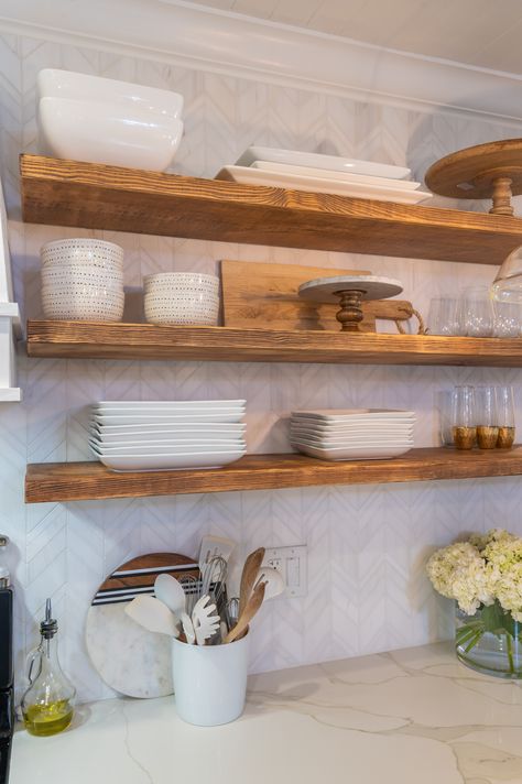 open floating wood shelves in kitchen with shiplap vent hood Pine Open Shelving Kitchen, Wooden Shelves Kitchen Farmhouse Style, Kitchen Farmhouse Shelves, Kitchen Floating Shelves For Dishes, Dark Floating Shelves Kitchen, Free Floating Kitchen Shelves, Wood Shelf Kitchen Floating Shelves, Kitchen Cabinets Shelves Ideas, Oak Open Shelves Kitchen