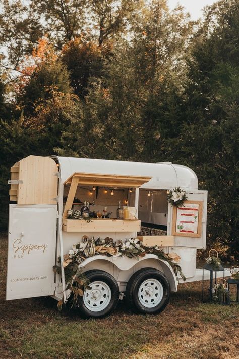 Meet Jolene. Our one-of-a-kind horse trailer bar. Horse Box Bar Interior, Horse Trailer Converted To Coffee Bar, Horse Trailer Bar Wedding, Remodeled Horse Trailers, Horse Trailer Flower Cart, Vintage Food Trailer, Travel Bar Trailer, Horse Trailer Cafe, Diy Horse Trailer Remodel Bar