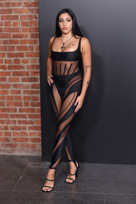 Kylie Jenner Pairs a Sheer Catsuit With a Black Thong For Her Boldest Outfit Yet Sheer Catsuit Outfit, Catsuit Outfit, Black Catsuit, Cfda Awards, Brooklyn Museum, Womens Style, Satin Pumps, Thierry Mugler, White Satin