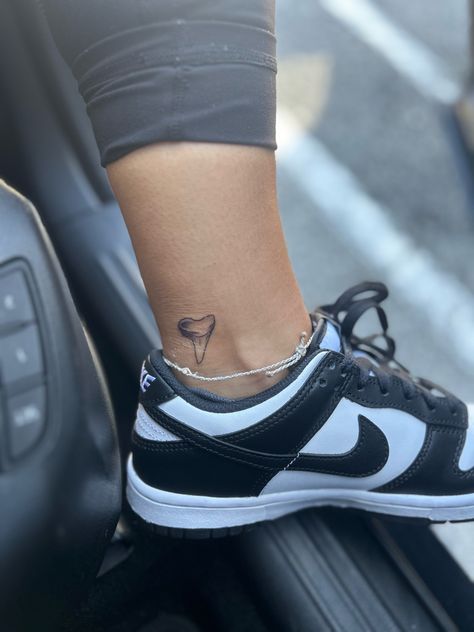 Small Shark Fin Tattoo, Line Shark Tattoo, Simple Line Shark Tattoo, Shark Ankle Tattoos For Women, Simple Shark Tooth Tattoo, Shark Fine Line Tattoo, Shark One Line Tattoo, Fine Line Shark Tattoo, Tattoo On Ankle