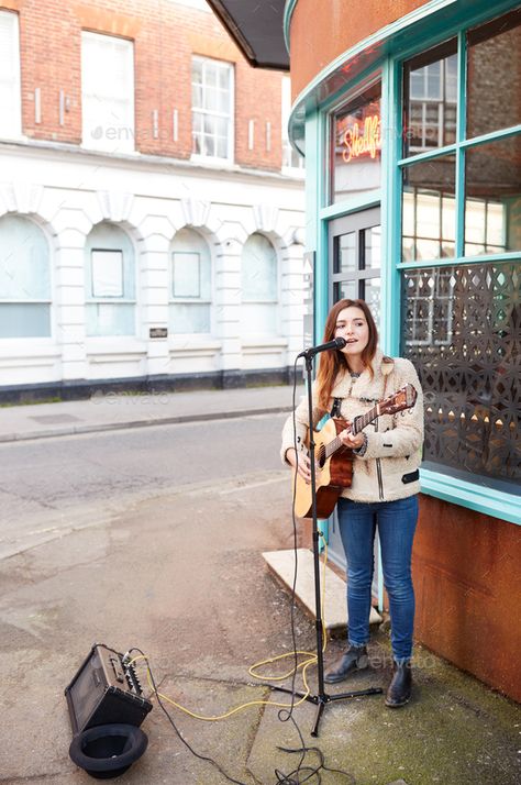 Female Musician Busking Playing Acoustic Guitar And Singing Outdoors In Street by monkeybusiness. Female Musician Busking Playing Acoustic Guitar And Singing Outdoors In Street #AD #Playing, #Acoustic, #Busking, #Female Busking Aesthetic, Street Guitarist Aesthetic, Playing Guitar Outside, Playing Guitar Outside Aesthetic, Guitar And Singing, Musician Aesthetic, Girl Playing Guitar Aesthetic, God Glory, Woman Playing Electric Guitar