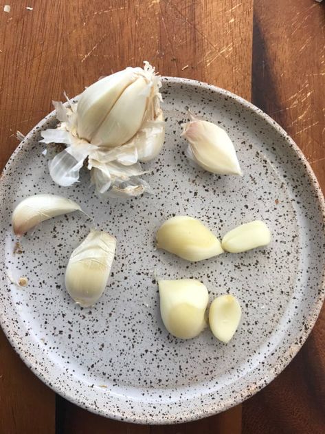 Here's How to Peel Garlic with a Microwave | Kitchn How To Peel Garlic, Homemade Rice Krispies, Homemade Rice Krispies Treats, Bake Sale Treats, Flaky Salt, Garlic Bulb, Butter Recipe, Food Tips, Kitchen Tips