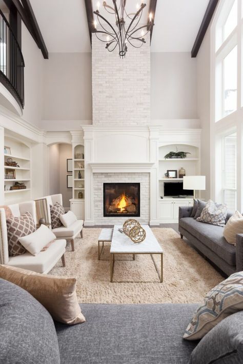 Pale Stone Fireplaces and White Mantel Ideas - Town & Country Living Formal Living Room Furniture, Formal Living Room Decor, Formal Living Room Designs, Design Camino, Living Room Cleaning, Design Salon, White Living Room, Design Del Prodotto, Beautiful Living Rooms