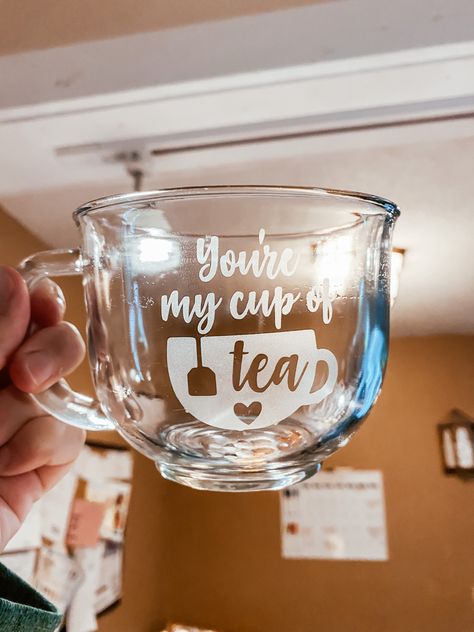 You’re My Cup of Tea Glass Etched Tea Cup #tea #tealover #youremycupoftea #glassetching #etchedglass #etchedglasscup #diy #aesthetic #craftycass #craftycasscustoms Glass Mug Design Ideas, Tea Cup Design Ideas, Diy Glass Mug Designs, Cup Engraving, Etched Glass Cups, Cricut Tea Cup Ideas, Tea Mug Aesthetic, Vinyl Glass Coffee Cup Ideas, Glass Mug Cricut