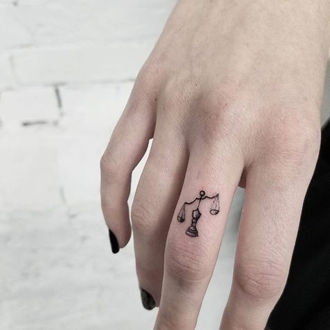 Tiny libra scale tattoo done by @release852 @inkandwatertattoo..If you are looking for one of a kind art, don't be shy, DM us to schedule an appointment or consulatation   Tag your friends help me grow ☘ #release852 #torontotattoo #torontotattooartist #ta Libra Scale Tattoo, Tattoo Main, Libra Constellation Tattoo, Justice Tattoo, Petit Tattoo, Libra Tattoo, Scale Tattoo, Tattoos Geometric, Zodiac Tattoos